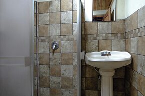 Capital O Hotel Villa Azura