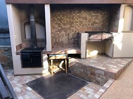 Capital O Hotel Villa Azura