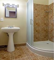 Capital O Hotel Villa Azura