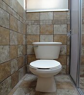 Capital O Hotel Villa Azura