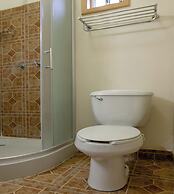 Capital O Hotel Villa Azura