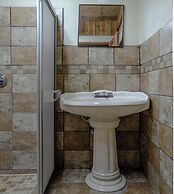 Capital O Hotel Villa Azura