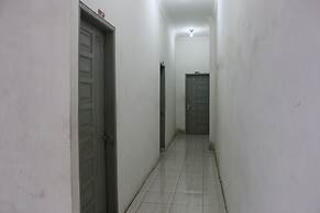 Penginapan Transit Tomato