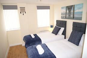Real - Queens Serviced Apartments