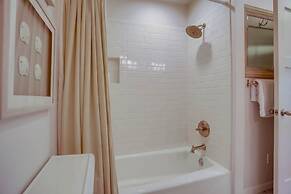 Coastal Chic Furnishings Condo Steps to Beach SBTC 128 by RedAwning