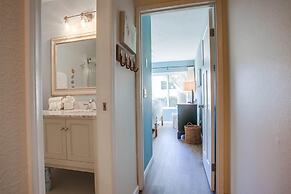Coastal Chic Furnishings Condo Steps to Beach SBTC 128 by RedAwning