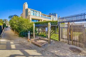 Coastal Chic Furnishings Condo Steps to Beach SBTC 128 by RedAwning