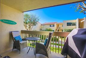 Coastal Chic Furnishings Condo Steps to Beach SBTC 128 by RedAwning