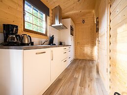 Wooden Chalet with Dishwasher near De Veluwe National Park