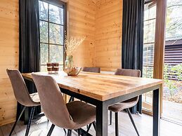 Wooden Chalet with Dishwasher near De Veluwe National Park