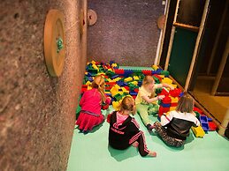 Wooden Chalet with Dishwasher near De Veluwe National Park