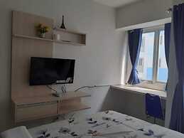 Grand Sentraland Karawang by Gkit Room