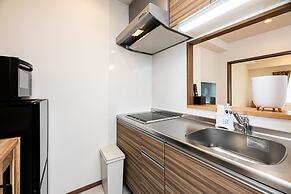 Tomariehotel & condominium