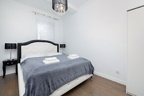 Supreme Apartment Mazowiecka by Renters