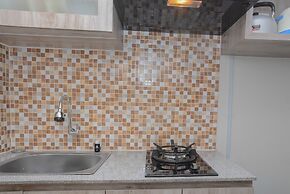 Comfy and Minimalist Studio at Amethyst Apartment