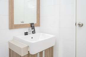 Cozy 2BR Apartment at Tuscany Residences With Garden View