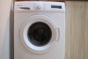 Homey and Warm Studio Apartment Oasis Cikarang