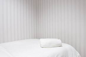 Pleasant and Homey 2BR Apartment at Tamansari La Grande