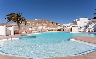 Sunset Balcony With Ocean Views and Pool Access