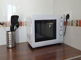 Sunset Balcony With Ocean Views and Pool Access