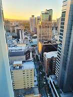 2BR Epic Views CBD 2 Cars Pool Wine Gym Netflix