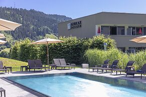 Alluring Apartment in Höggen near Ski Slopes with Sauna