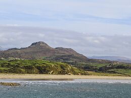 Dinlle