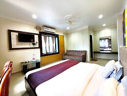 Goroomgo Sai Sandpiper Puri