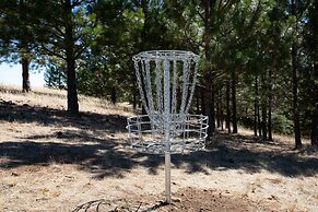 The Oaks Home features Private Disc Golf Course by RedAwning