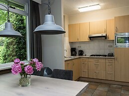 Cozy House With a Fireplace in a Holiday Park in a Natural Area