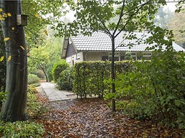Cozy House With a Fireplace in a Holiday Park in a Natural Area