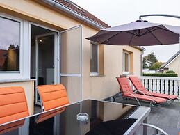 Snug Apartment in Kalkhorst with Terrace near City Center