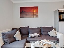 Snug Apartment in Kalkhorst with Terrace near City Center