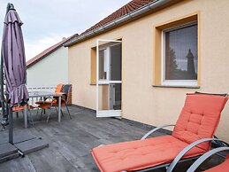 Snug Apartment in Kalkhorst with Terrace near City Center