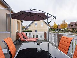 Snug Apartment in Kalkhorst with Terrace near City Center