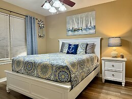 Lakefront Vacation Condo A-3 with Overlooking Deck by RedAwning