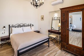 Day One Fira Mansion