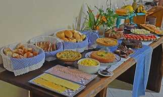 Pousada La Ferrugem Suites