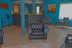 Pousada La Ferrugem Suites