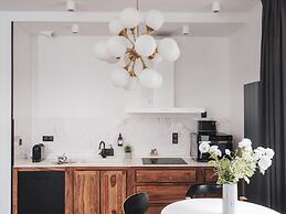 Appartements Place Royale - Maisons du Monde Hôtel & Suites