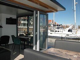 Beautiful Houseboat in the Harbour of Volendam Near Centre