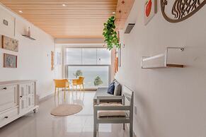 RV03 Quarto e Sala Vista Mar