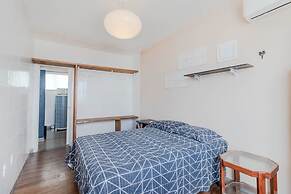 RV03 Quarto e Sala Vista Mar