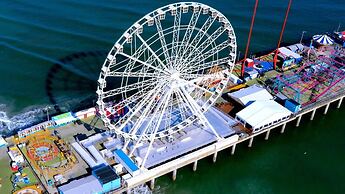 Boardwalk 2BR 3BA Condo by CozySuites