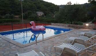 Tennis court and outdoor pool villa