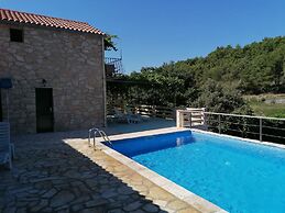 Tennis court and outdoor pool villa