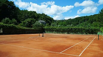 Tennis court and outdoor pool villa