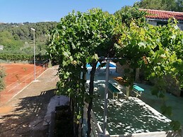Tennis court and outdoor pool villa