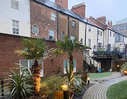 THE Sawmill Glossy Sleek Peaceful City Centre red