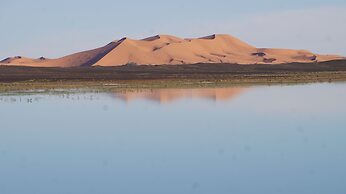 Room-sleeping in a Luxury Tent in Merzou